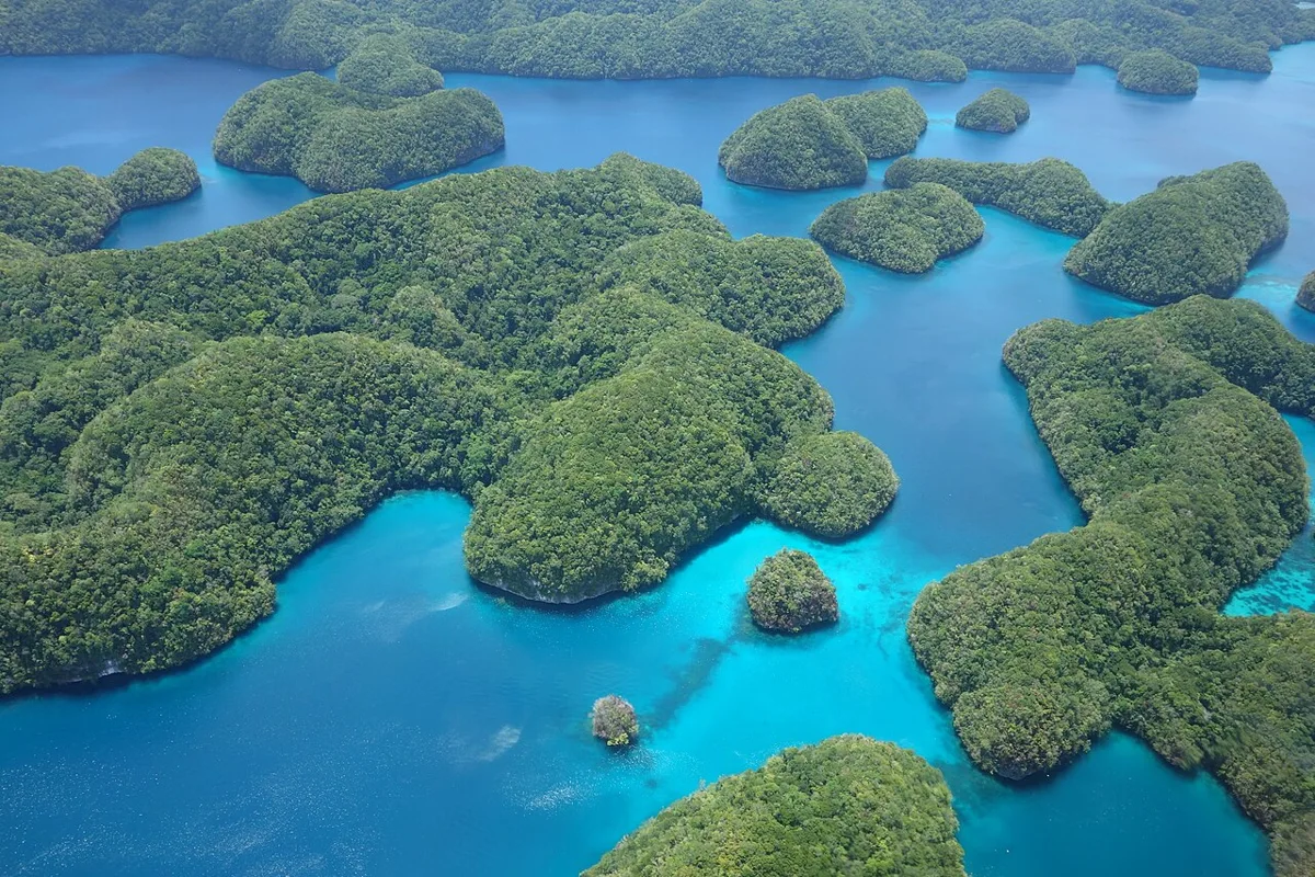 Aerial view of the Rock Islands, Palau, 2016. Cultural and historical context is provided by the cited heritage record.