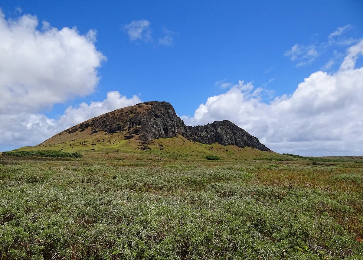 Rano Raraku seen from the south, Rapa Nui. The caption does not infer the meaning of individual moai from a distant view.